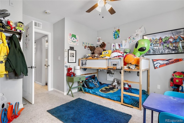 bedroom featuring ceiling fan and light carpet