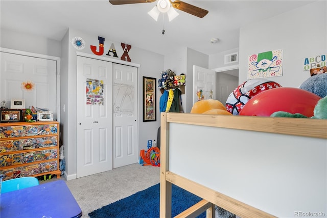 bedroom featuring carpet floors, ceiling fan, and a closet