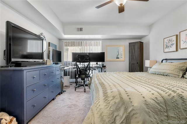 bedroom with light colored carpet