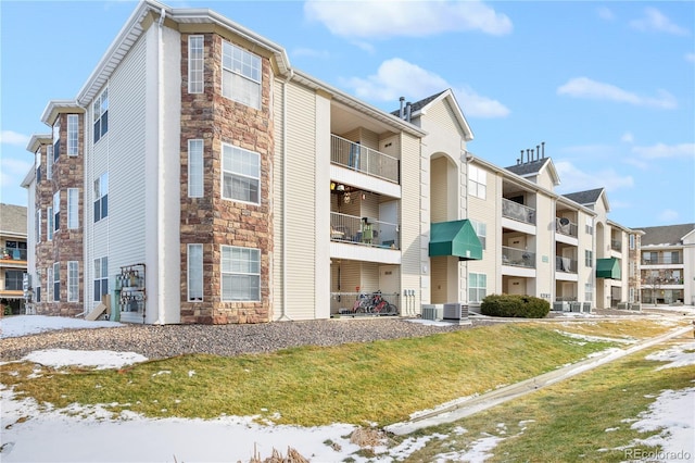 view of property with central AC unit