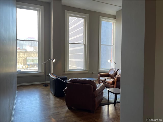 1555 California St Unit 302, Denver, CO 80202 - sitting room with dark wood finished floors