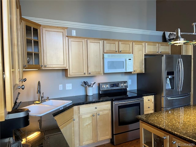 1555 California St Unit 302, Denver, CO 80202 - kitchen with appliances with stainless steel finishes, light brown cabinetry, glass insert cabinets, and tile counters