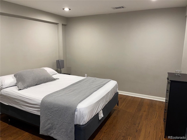1555 California St Unit 302, Denver, CO 80202 - bedroom featuring dark wood-type flooring and recessed lighting