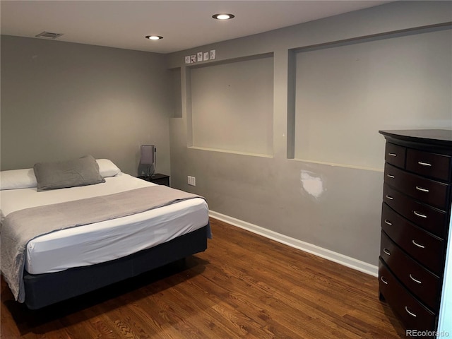 1555 California St Unit 302, Denver, CO 80202 - bedroom featuring dark wood-style flooring and recessed lighting
