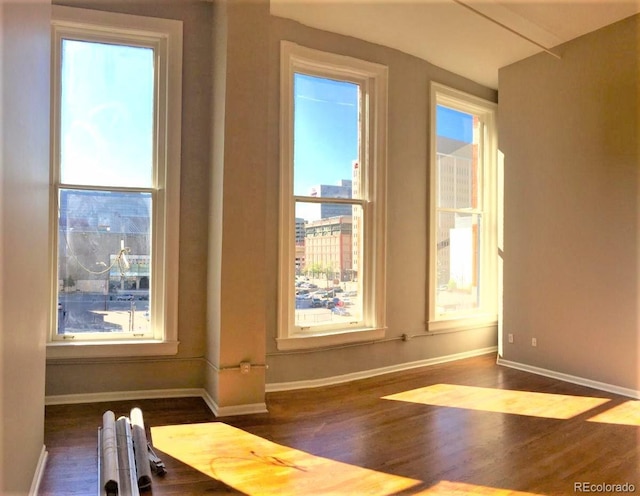 1555 California St Unit 302, Denver, CO 80202 - workout area featuring wood finished floors