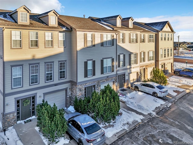 view of front of home with a garage