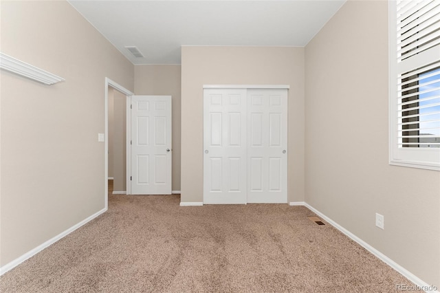 15525 Quince Cir, Thornton, CO 80602 - unfurnished bedroom with carpet floors, a closet, and baseboards