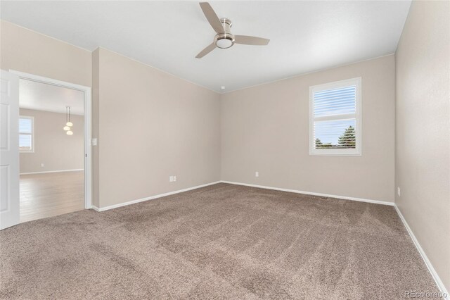 15525 Quince Cir, Thornton, CO 80602 - carpeted spare room featuring ceiling fan and baseboards