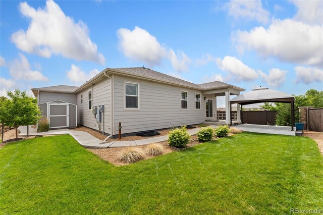 15525 Quince Cir, Thornton, CO 80602 - rear view of house featuring a gazebo and a patio