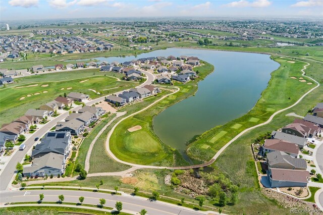 15525 Quince Cir, Thornton, CO 80602 - aerial overview of property's location with nearby suburban area, a large body of water, and a local golf course
