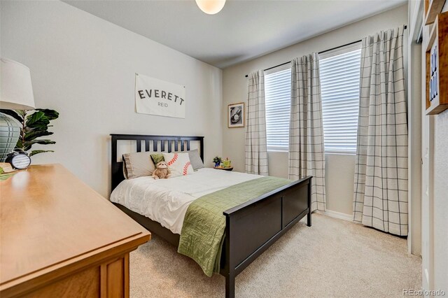 10499 Rolling Peaks Dr, Peyton, CO 80831 - bedroom featuring light colored carpet