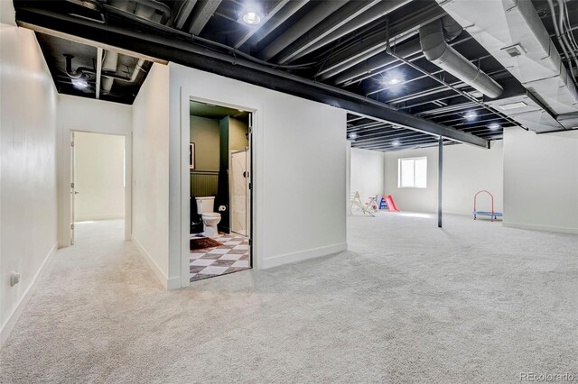 10499 Rolling Peaks Dr, Peyton, CO 80831 - below grade area with carpet floors and baseboards