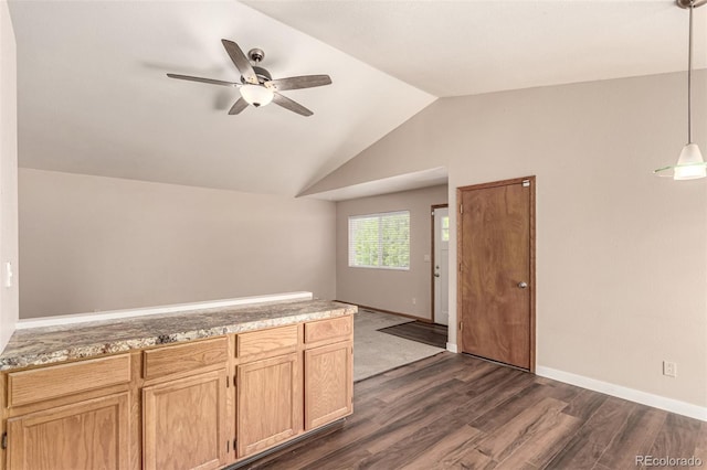 4318 Suncreek Dr, Loveland, CO 80538 - interior space featuring baseboards, dark wood finished floors, ceiling fan, and vaulted ceiling