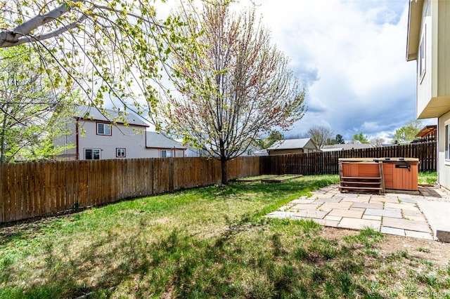 4318 Suncreek Dr, Loveland, CO 80538 - view of yard featuring a fenced backyard, a patio, and a hot tub