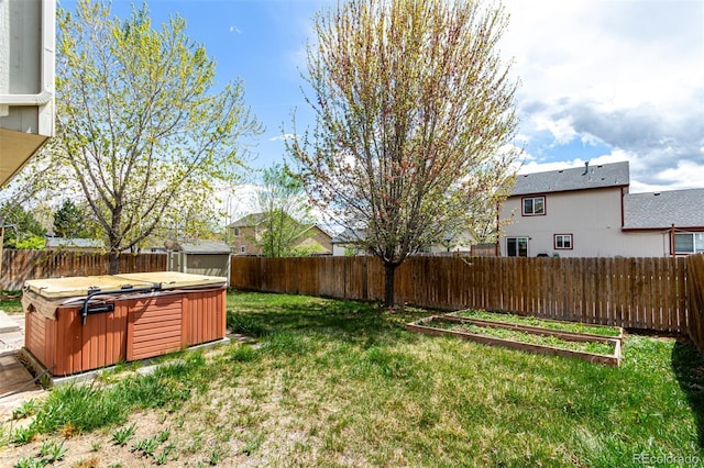 4318 Suncreek Dr, Loveland, CO 80538 - view of yard with a fenced backyard and a hot tub