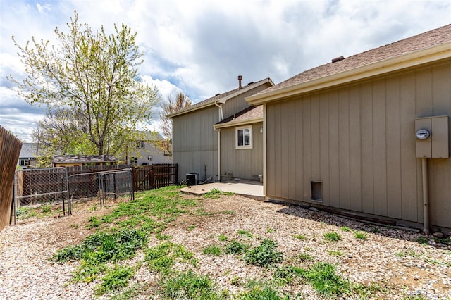 4318 Suncreek Dr, Loveland, CO 80538 - rear view of property with central AC, fence, and a patio area
