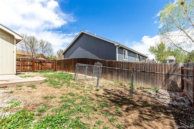 4318 Suncreek Dr, Loveland, CO 80538 - view of yard featuring a fenced backyard and a gate