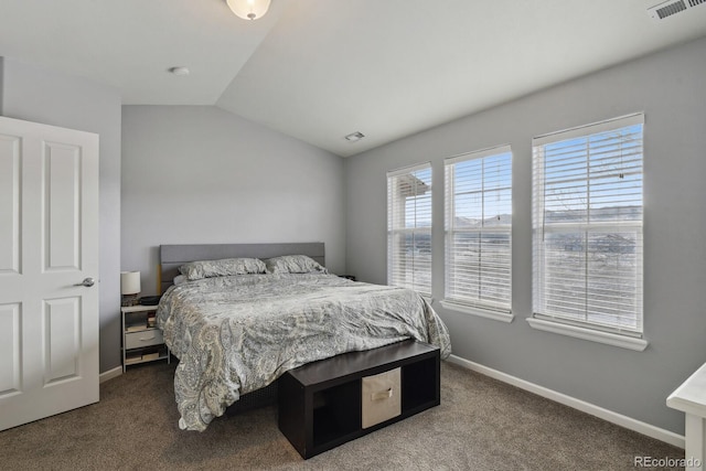 carpeted bedroom featuring lofted ceiling