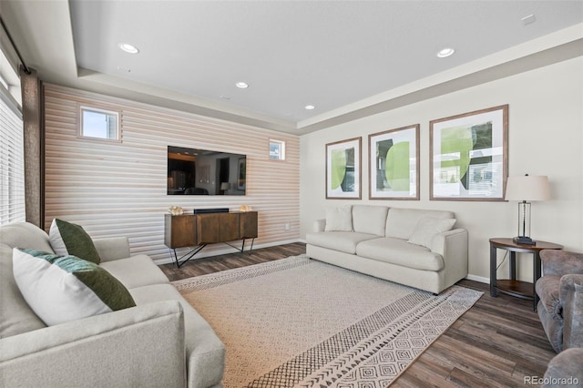 living room with dark hardwood / wood-style flooring