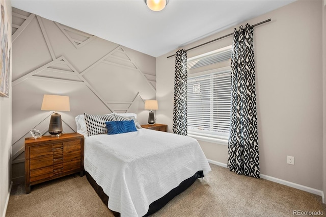 bedroom featuring light colored carpet