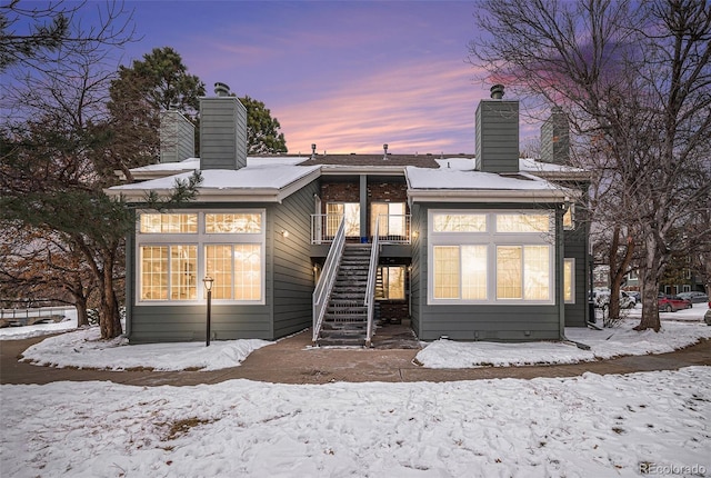 view of snow covered property