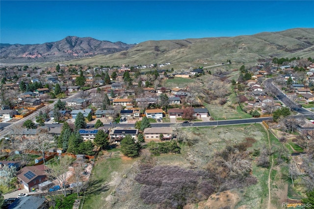 drone / aerial view with a mountain view and a residential view
