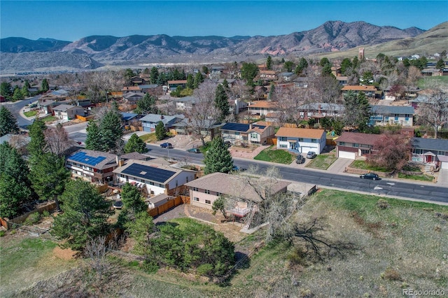drone / aerial view with a mountain view and a residential view