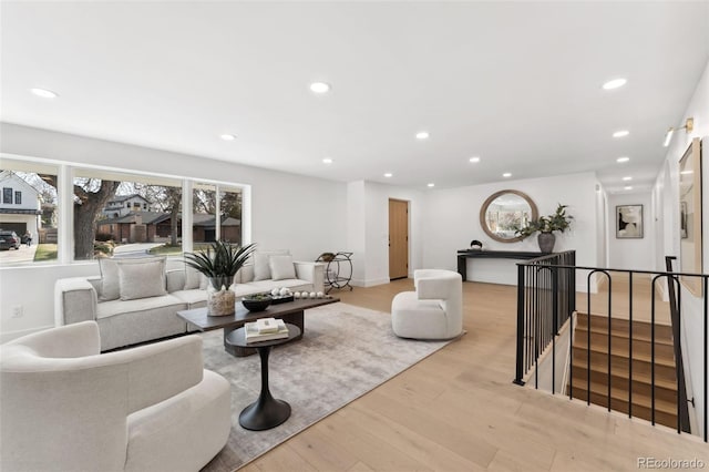 living room featuring recessed lighting and wood finished floors