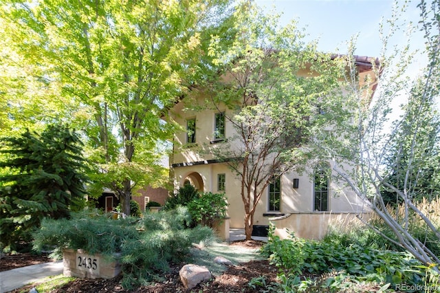 2435 S Milwaukee St, Denver, CO 80210 - view of property exterior featuring stucco siding