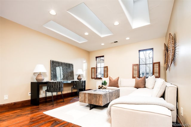 2435 S Milwaukee St, Denver, CO 80210 - living area featuring wood finished floors, recessed lighting, and a skylight