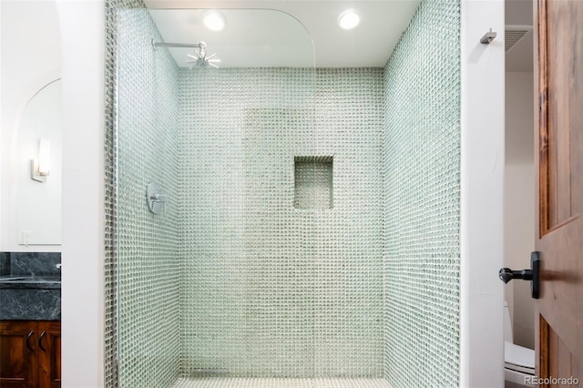2435 S Milwaukee St, Denver, CO 80210 - bathroom with vanity, toilet, a shower stall, and recessed lighting