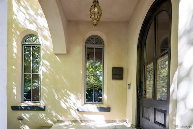 2435 S Milwaukee St, Denver, CO 80210 - view of exterior entry featuring stucco siding