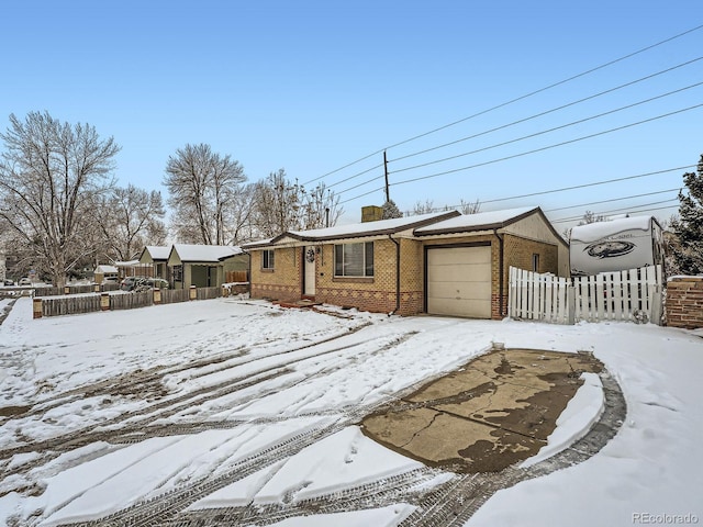 ranch-style house with a garage