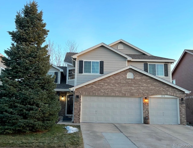 view of front of property with a garage