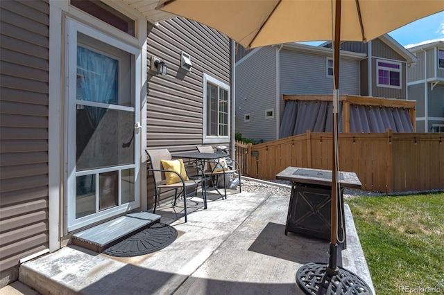 view of patio / terrace with fence