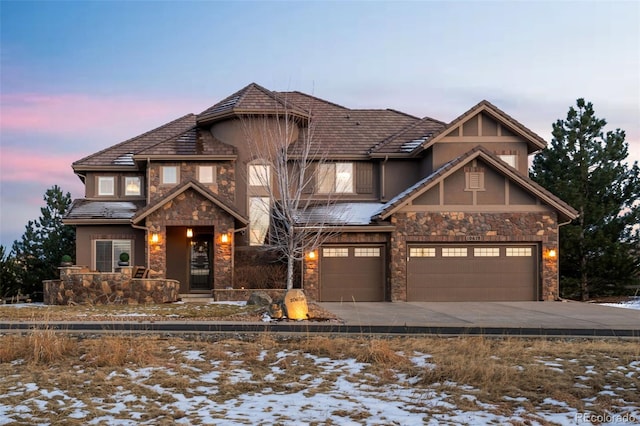 tudor-style house with a garage