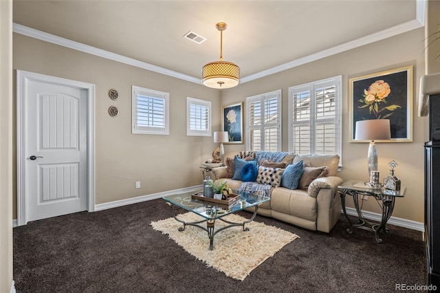 carpeted living room with ornamental molding and a healthy amount of sunlight