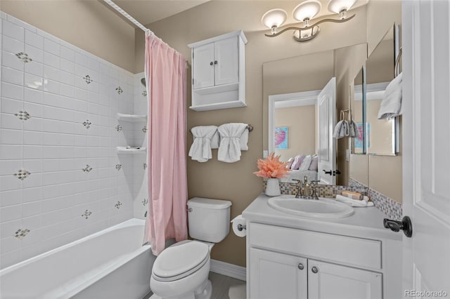 full bathroom with vanity, shower / bath combination with curtain, and toilet