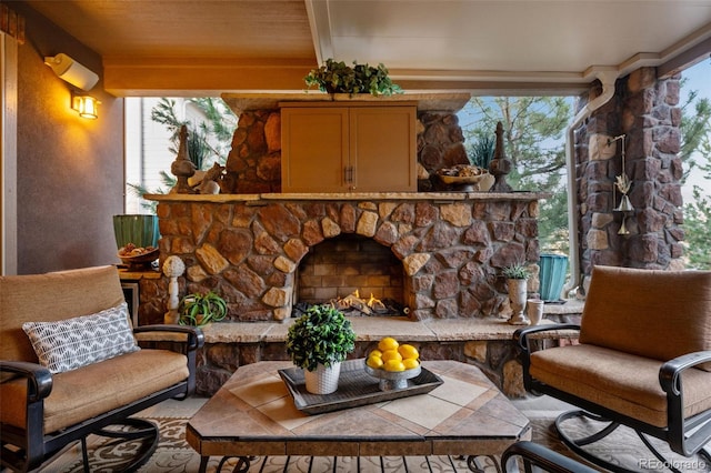 exterior space featuring an outdoor stone fireplace