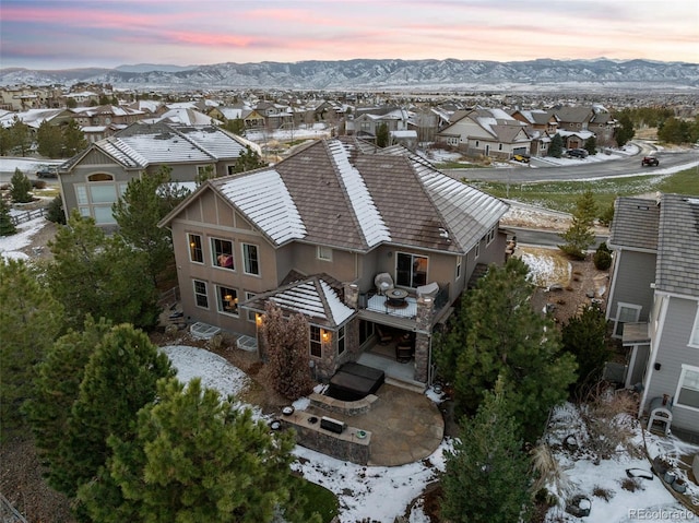 aerial view at dusk with a mountain view