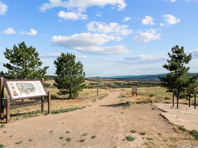 view of yard with a rural view