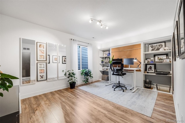 5280 Genoa St, Denver, CO 80249 - office space featuring wood finished floors