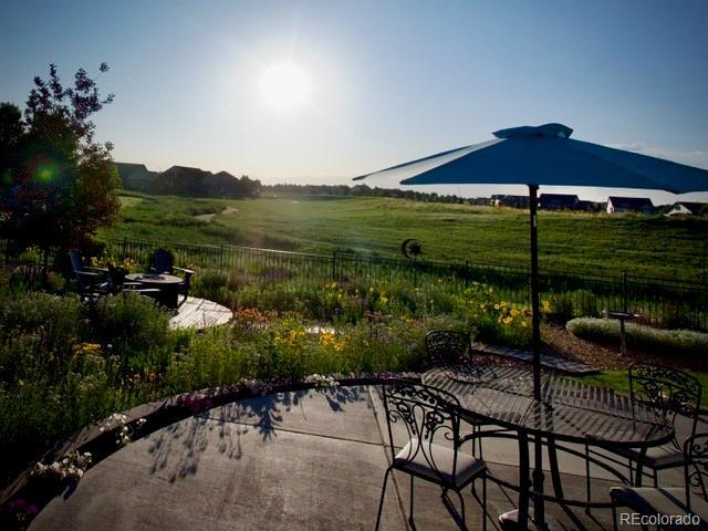 5280 Genoa St, Denver, CO 80249 - view of patio / terrace featuring a view of countryside