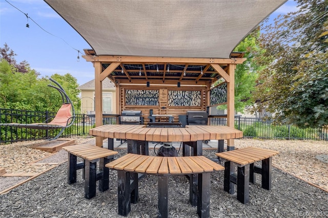 5280 Genoa St, Denver, CO 80249 - view of patio / terrace featuring outdoor dining space and a grill