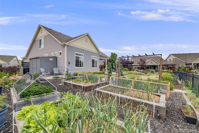 5280 Genoa St, Denver, CO 80249 - rear view of house featuring a garden and an attached garage