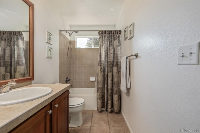 full bath with tile patterned floors, toilet, shower / bath combo, baseboards, and vanity