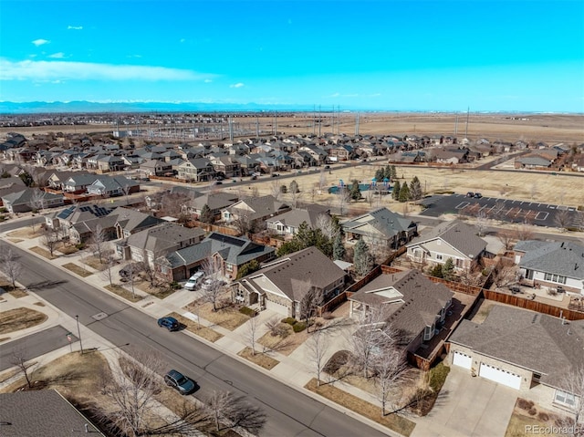 aerial view with a mountain view and a residential view