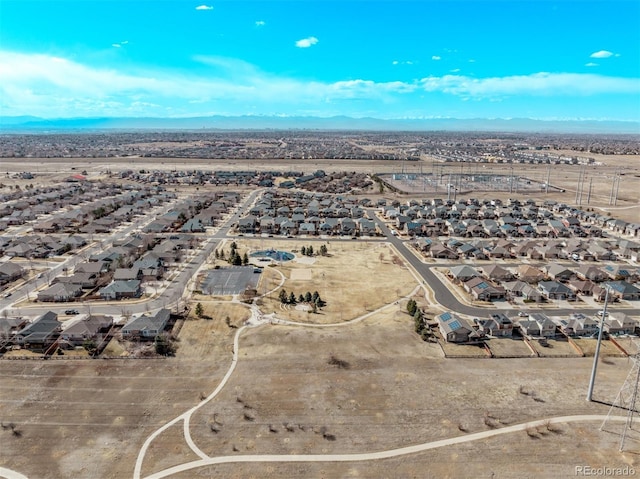 drone / aerial view with a mountain view and a residential view