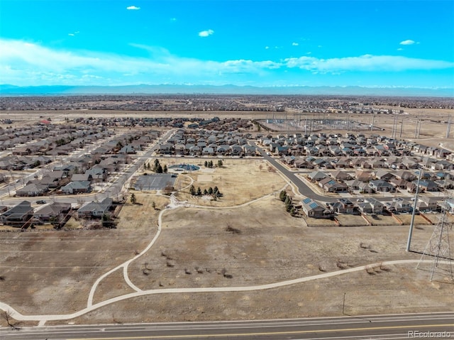 drone / aerial view with a mountain view and a residential view