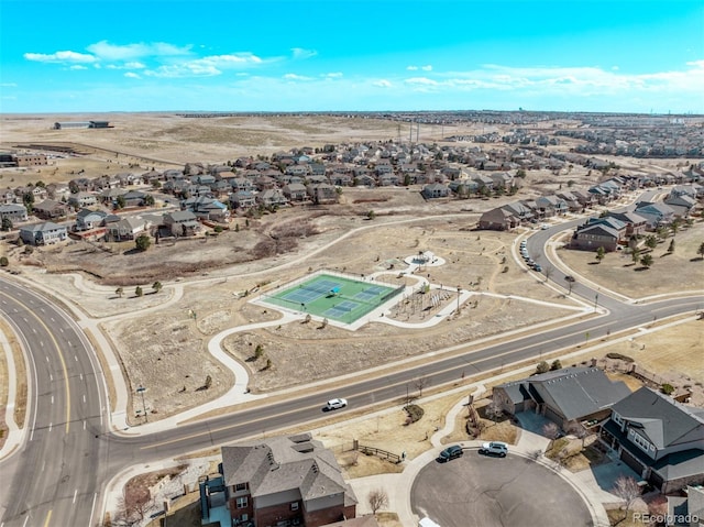 birds eye view of property with a residential view